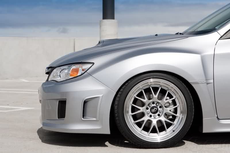 2012 Subaru Impreza with 18x9.5 Rota MXR wheels