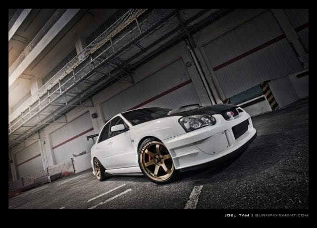 2004 Subaru Impreza with 18x9.5 Rota Grid wheels