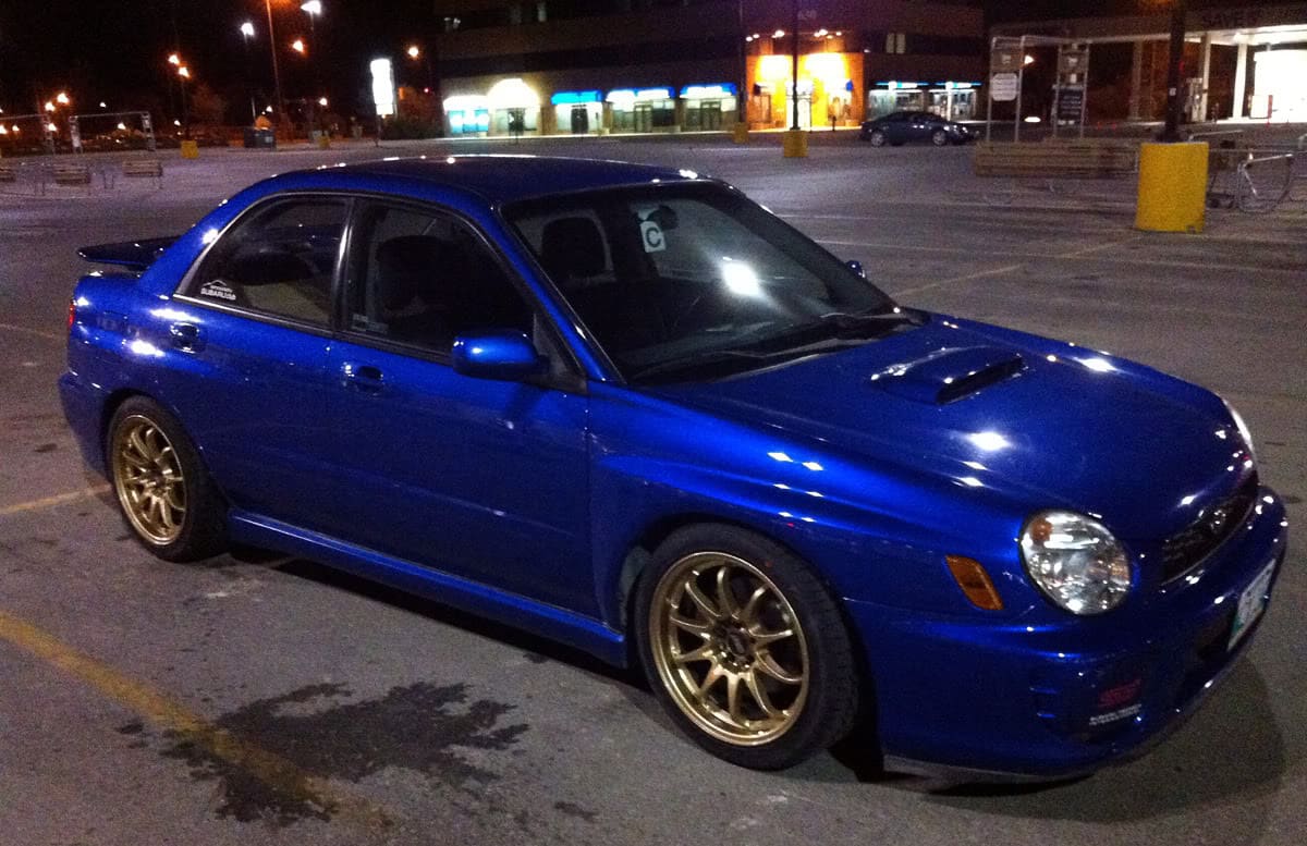 2003 Subaru Impreza with 17x9 Rota DPT wheels