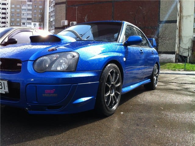 2004 Subaru Impreza with 18x8.5 Rota G-Force wheels