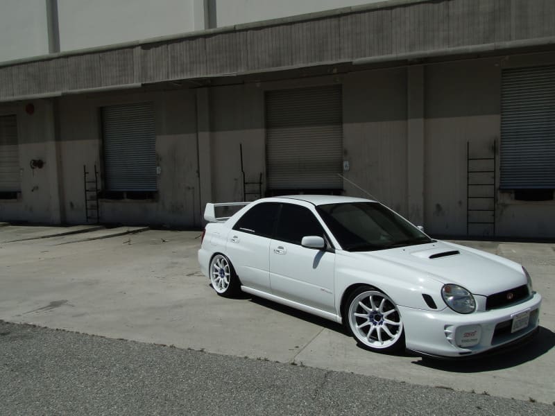 2003 Subaru Impreza with 18x9.5 Rota DPT wheels