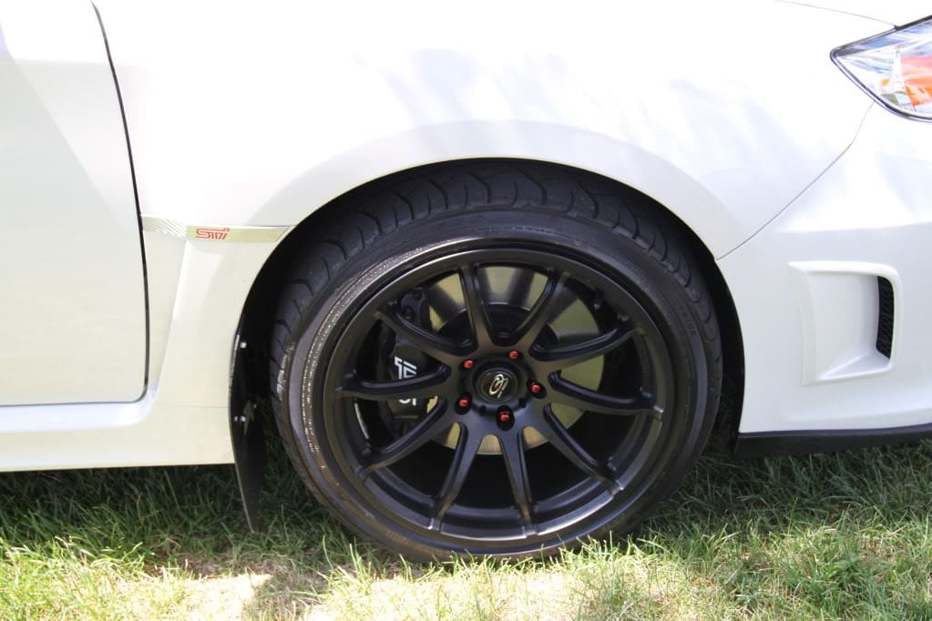 2015 Subaru WRX STI with 18x9.5 Rota T2R wheels