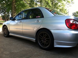 2007 Subaru Impreza with 17x7.5 Rota Subzero wheels