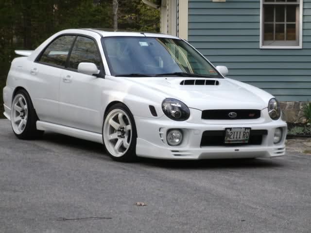 2002 Subaru Impreza with 18x9.5 Rota Grid wheels