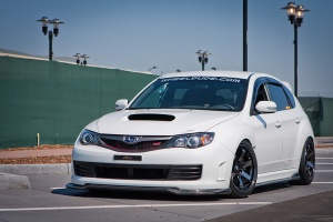2010 Subaru Impreza with 18x9.5 Rota Grid wheels