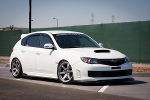 2010 Subaru Impreza with 18x9.5 Rota Grid wheels