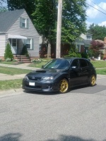2011 Subaru Impreza WRX with 18x8.5 Rota SVN wheels