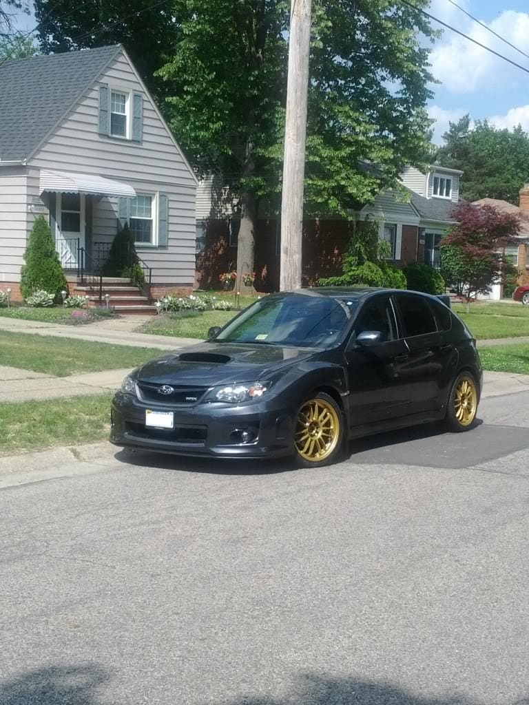 2011 Subaru Impreza WRX with 18x8.5 Rota SVN wheels
