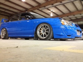 2004 Subaru Impreza with 18x9.5 Rota DPT wheels