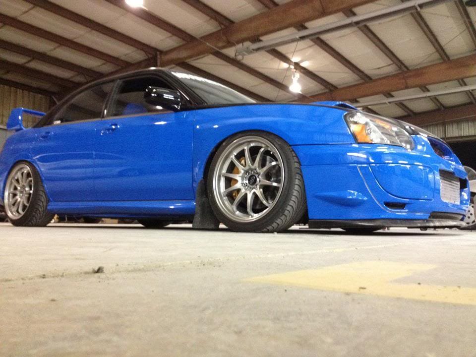 2004 Subaru Impreza with 18x9.5 Rota DPT wheels