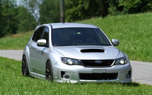 2011 Subaru Impreza WRX with 18x9 Rota G-Force wheels