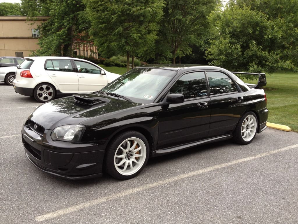 2004 Subaru Impreza with 17x9 Rota DPT wheels
