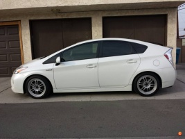 2012 Toyota Prius with 17x8 Enkei RPF1 wheels