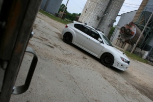 2011 Subaru Impreza WRX with 18x8.5 Rota G-Force wheels