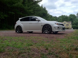 2011 Subaru Impreza WRX with 18x8.5 Rota Grid wheels