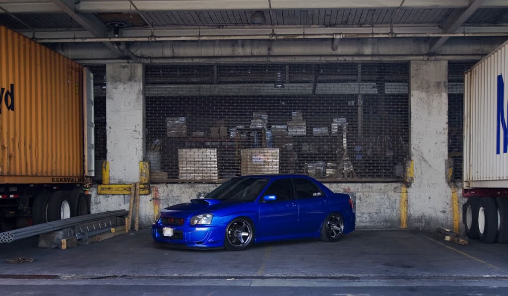 2004 Subaru Impreza with 18x9.5 Rota Grid wheels
