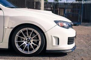 2011 Subaru Impreza WRX with 18x9.5 Rota PWR wheels