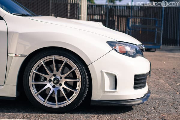 2011 Subaru Impreza WRX with 18x9.5 Rota PWR wheels