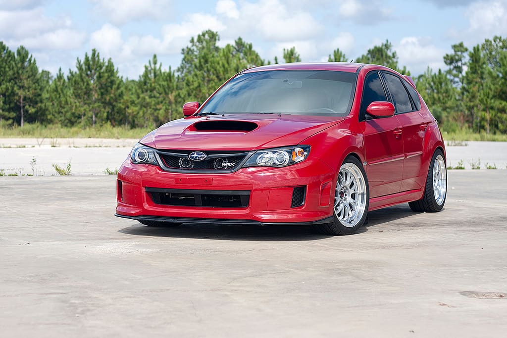 2011 Subaru Impreza WRX with 18x9.5 Rota MXR wheels