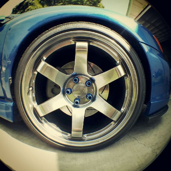 2009 Subaru Impreza with 18x9.5 Rota Grid wheels
