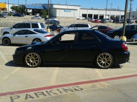 2003 Subaru Impreza with 18x9 Rota G-Force wheels