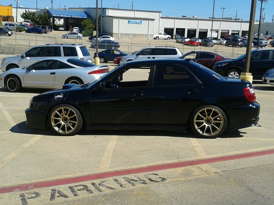 2003 Subaru Impreza with 18x9 Rota G-Force wheels