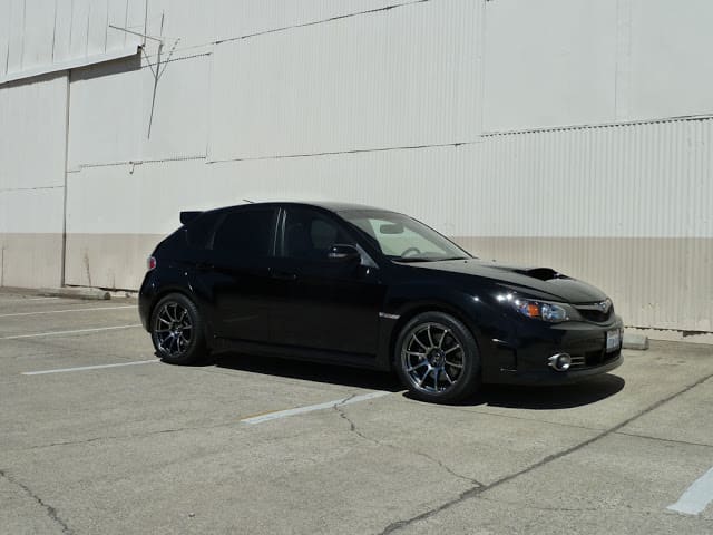 2011 Subaru Impreza WRX with 18x9 Rota G-Force wheels