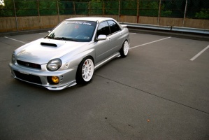 2003 Subaru Impreza with 18x9.5 Rota DPT wheels
