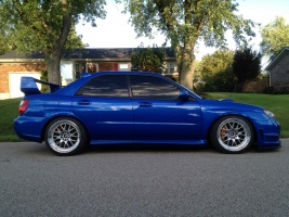 2006 Subaru Impreza with 18x9.5 Rota MXR wheels
