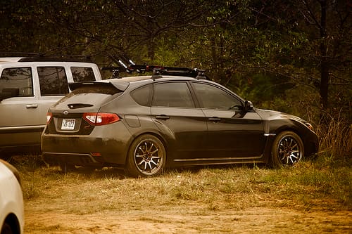 2011 Subaru Impreza WRX with 18x9.5 Rota DPT wheels