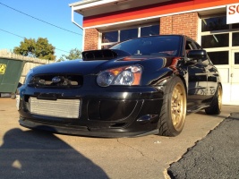 2004 Subaru Impreza with 18x9.5 Rota MXR wheels