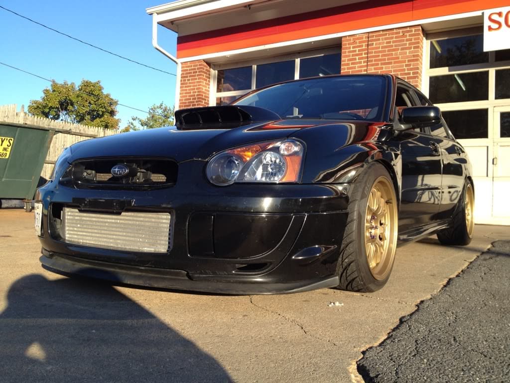 2004 Subaru Impreza with 18x9.5 Rota MXR wheels