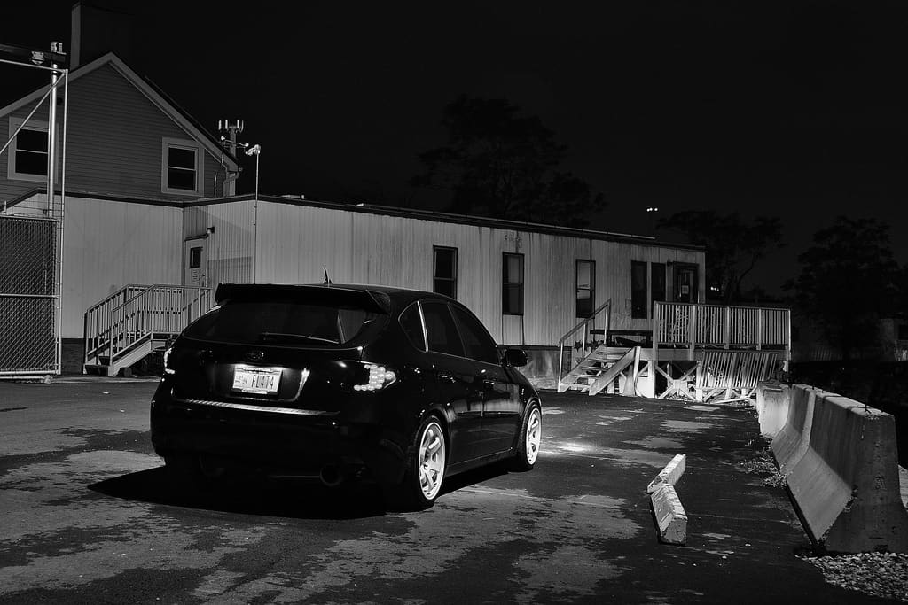 2011 Subaru Impreza WRX with 17x9 Rota Grid wheels