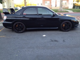2007 Subaru Impreza with 18x8 Rota P45F wheels