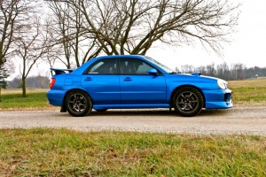 2003 Subaru Impreza with 17x8 Rota Boost wheels