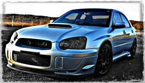 2004 Subaru Impreza with 17x8 Rota G-Force wheels