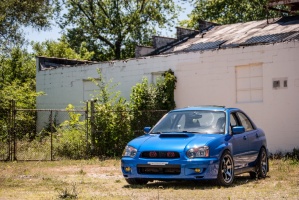 2004 Subaru Impreza with 17x9 Rota Grid wheels
