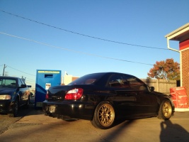 2007 Subaru Impreza with 18x9.5 Rota MXR wheels