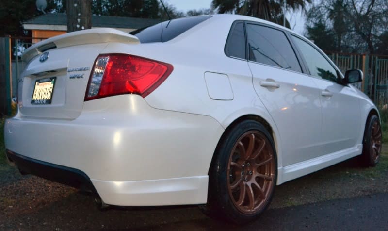 2011 Subaru Impreza WRX with 18x9 Rota G-Force wheels