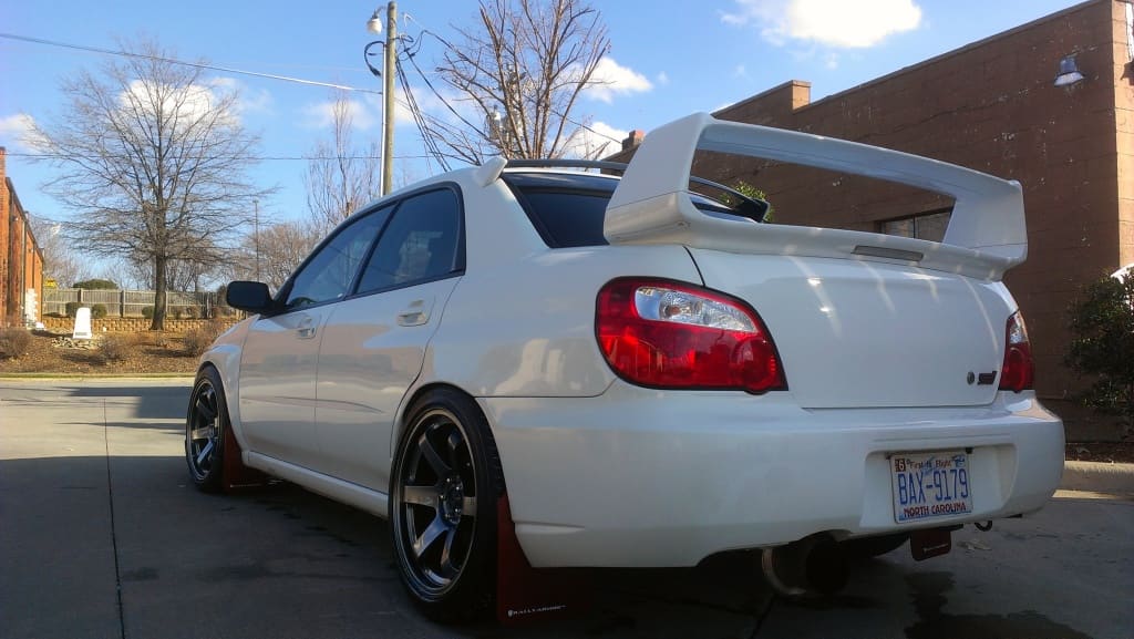 2006 Subaru Impreza with 18x9.5 Rota Grid wheels