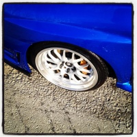 2009 Subaru Impreza with 18x9.5 Rota MXR wheels