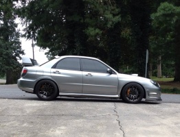 2007 Subaru Impreza with 18x9.5 Rota DPT wheels