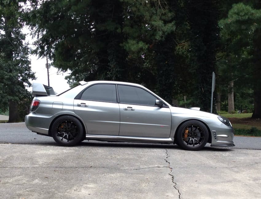 2007 Subaru Impreza with 18x9.5 Rota DPT wheels