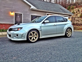 2011 Subaru Impreza WRX with 18x8.5 Rota Grid wheels