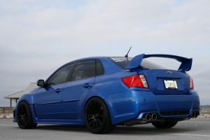 2011 Subaru Impreza with 18x9.5 Rota PWR wheels