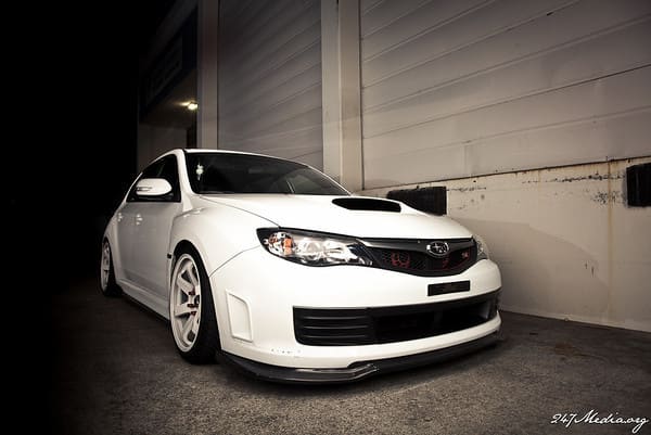 2011 Subaru Impreza WRX with 18x9.5 Rota Grid wheels