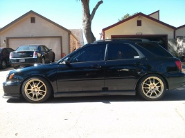2002 Subaru Impreza with 17x8 Rota Torque wheels