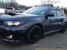 2009 Subaru Impreza with 18x8 Rota Gravel wheels