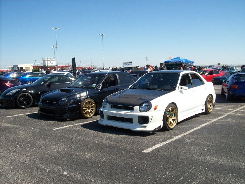 2002 Subaru Impreza with 18x9.5 Rota Grid wheels