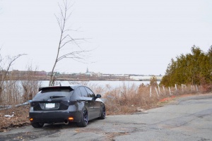 2011 Subaru Impreza WRX with 18x9.5 Rota Grid wheels